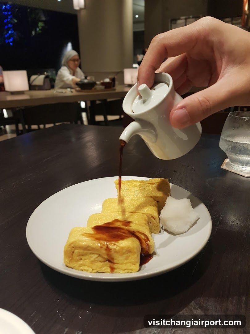Pouring Sauce Over Omelette Roll