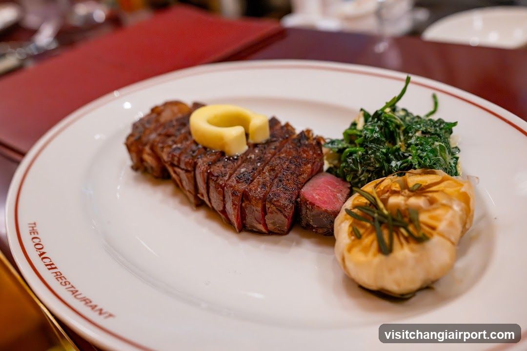 Steak with sides at The Coach Restaurant