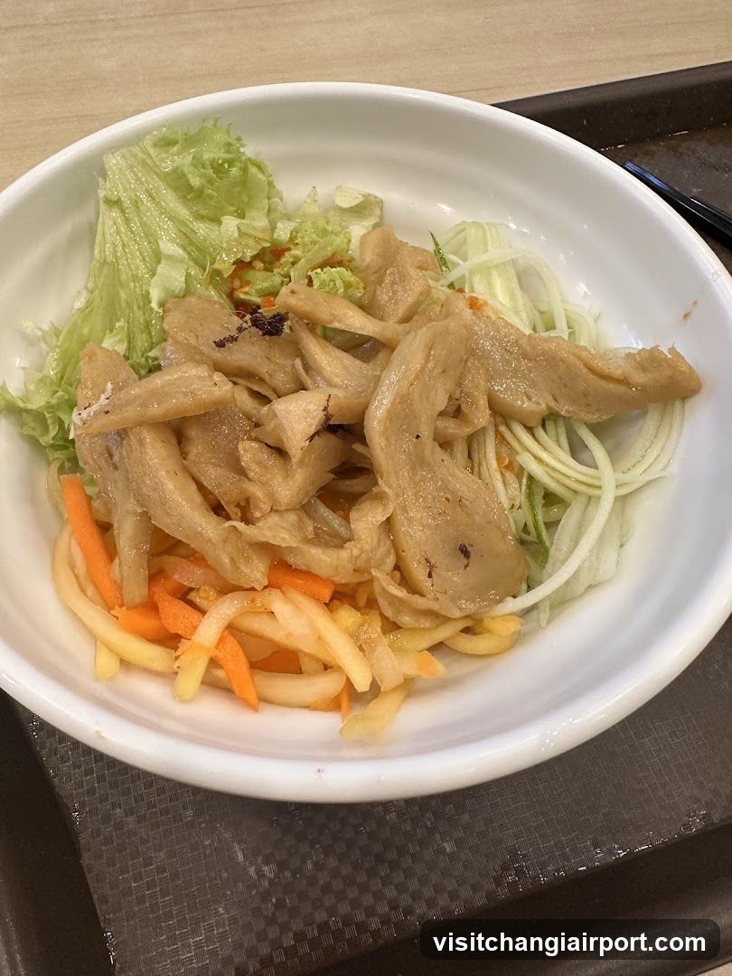 Bowl of Salad with Chicken and Vegetables