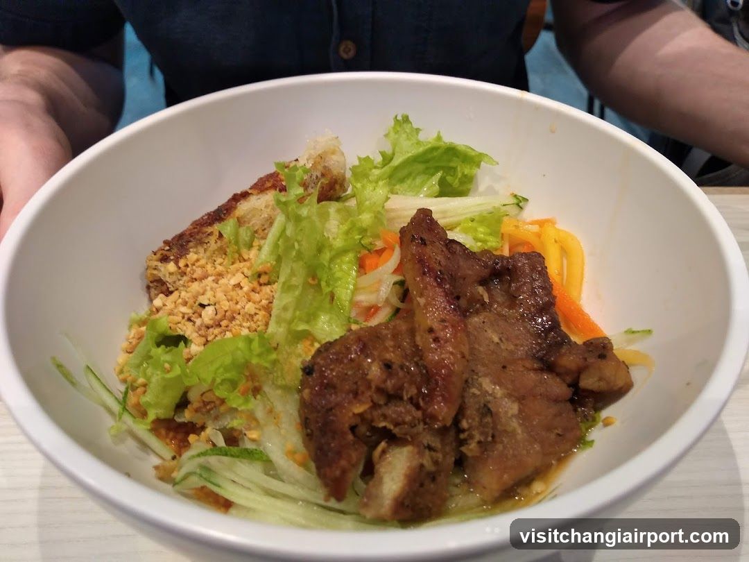 Bowl of Grilled Meat Salad with Vegetables and Noodles