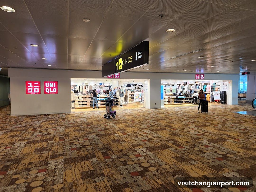 Airport Terminal Interior with Storefronts