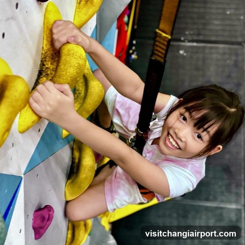 Child Climbing Indoor Wall