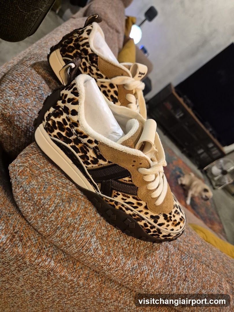 Leopard Print Sneakers on Sofa