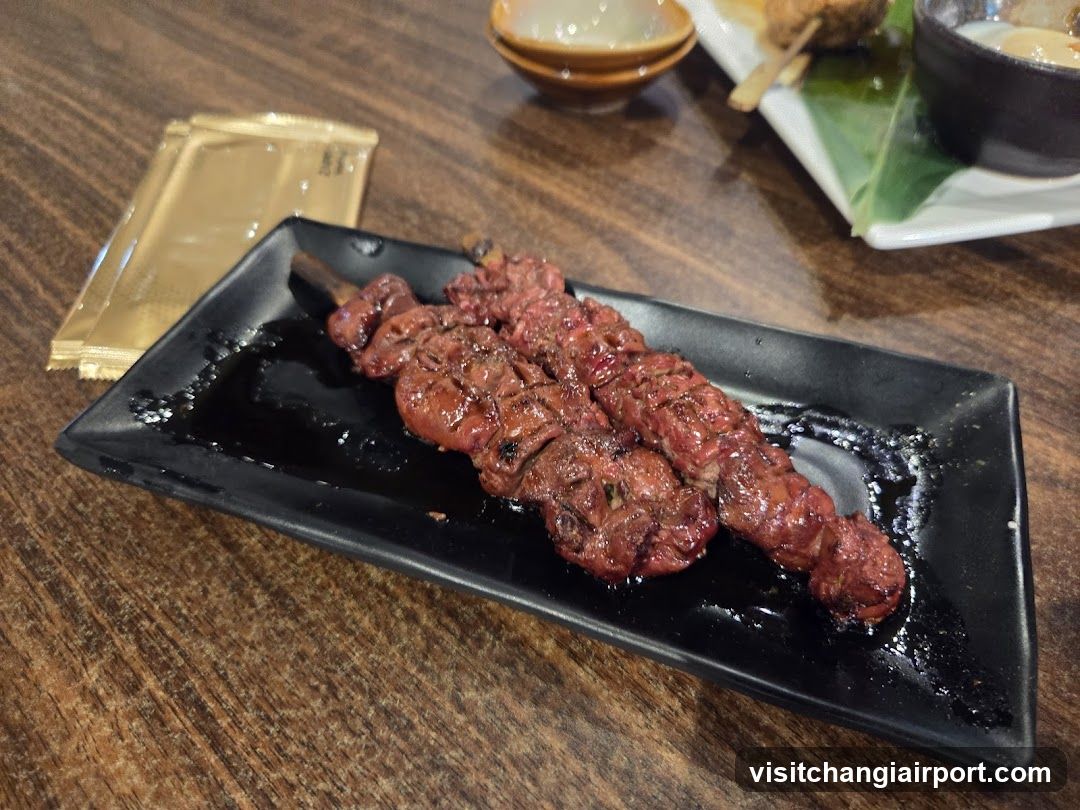 Grilled Skewers on Black Plate