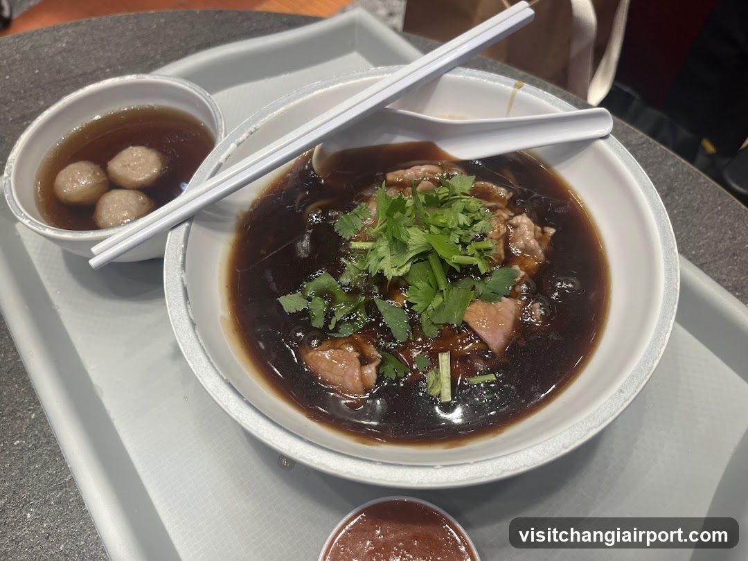 Bowl of Soup with Meatballs and Cilantro