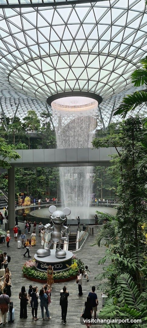 Indoor Waterfall and Mickey Mouse Statue