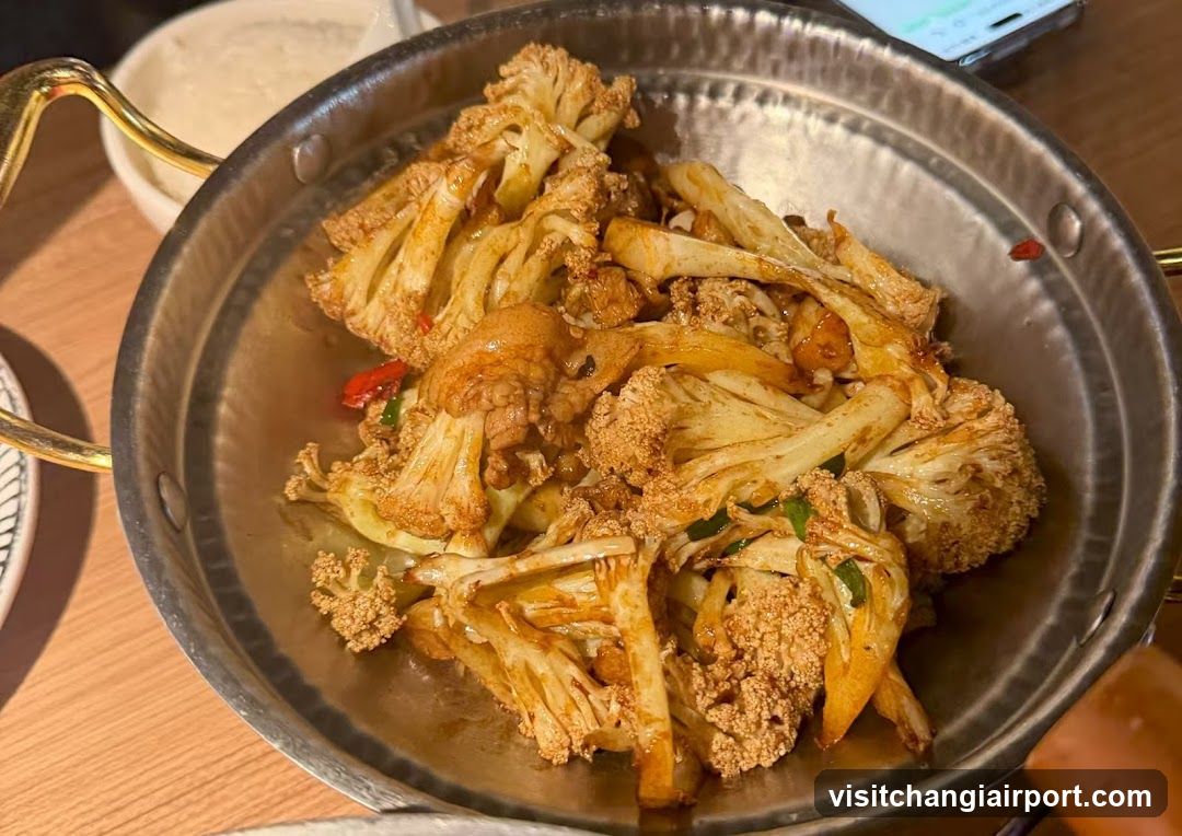 Stir-fried Cauliflower with Chicken in Metal Pot