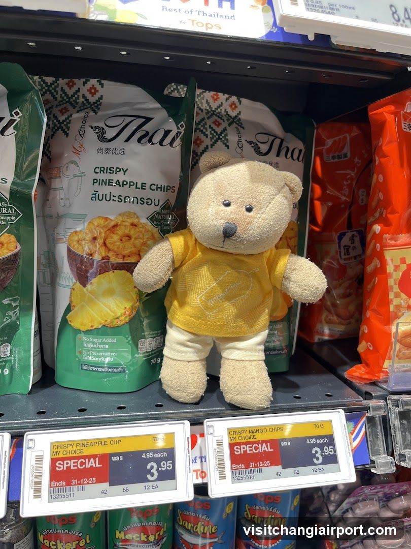 Shelf with snacks and plush toy