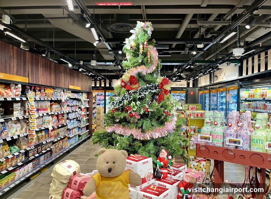 Christmas Tree in Grocery Store Aisle