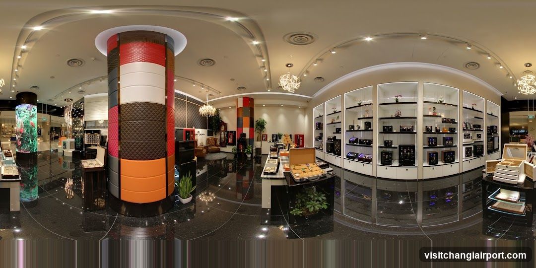Interior of a modern retail store with product displays and decorative elements.