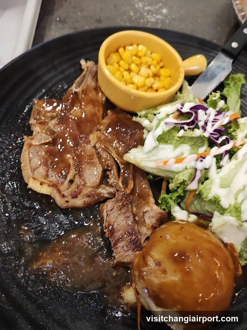 Grilled Steak Plate with Salad and Corn