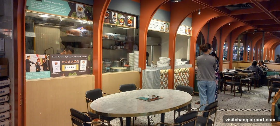 Restaurant Interior with Kitchen View