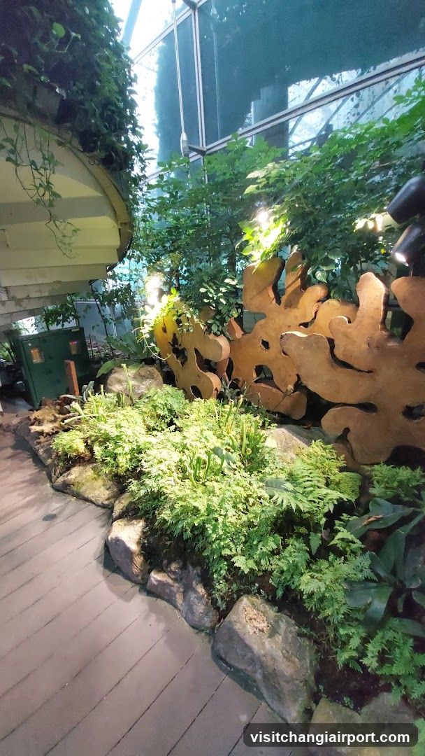 Indoor Garden Scene with Decorative Sculpture