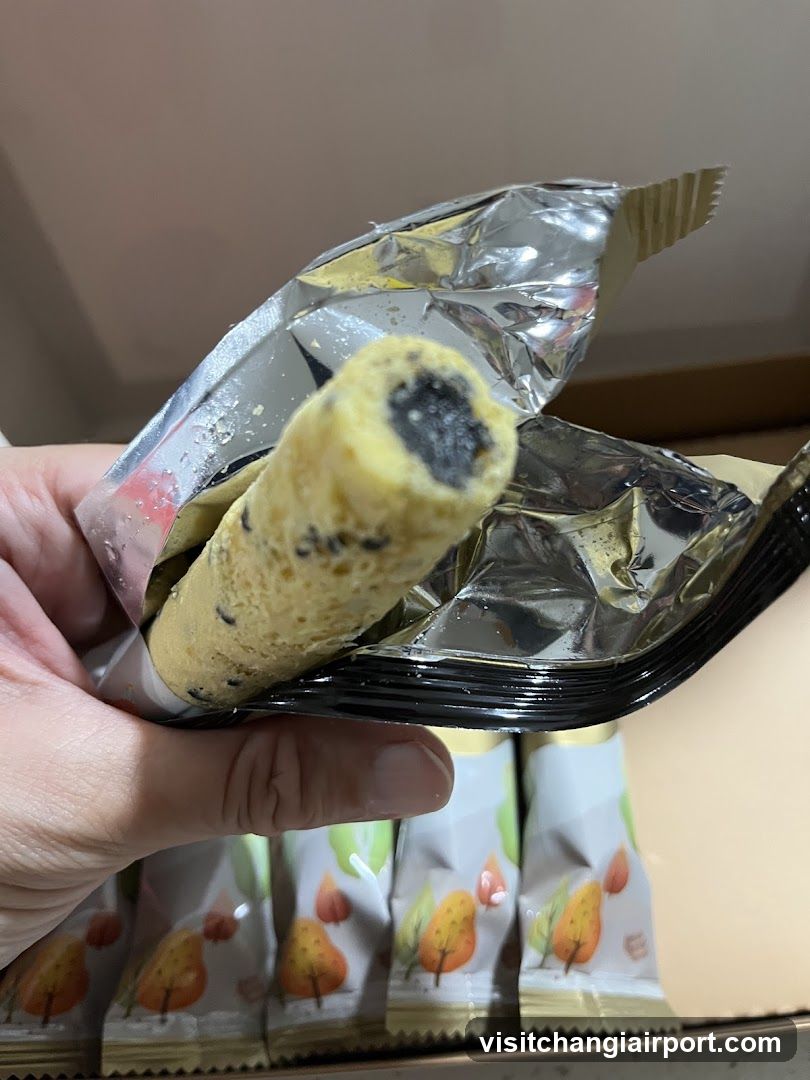 Hand holding a snack bar