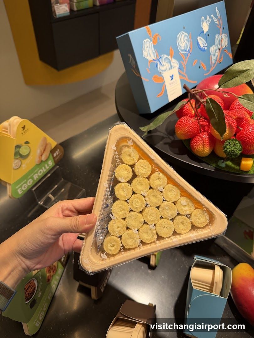 Food Display with Egg Rolls and Fruit