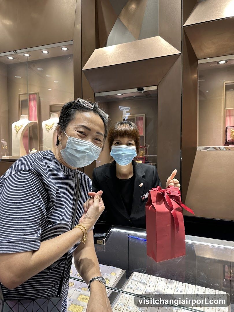 Jewelry Store Interior with Staff and Customer