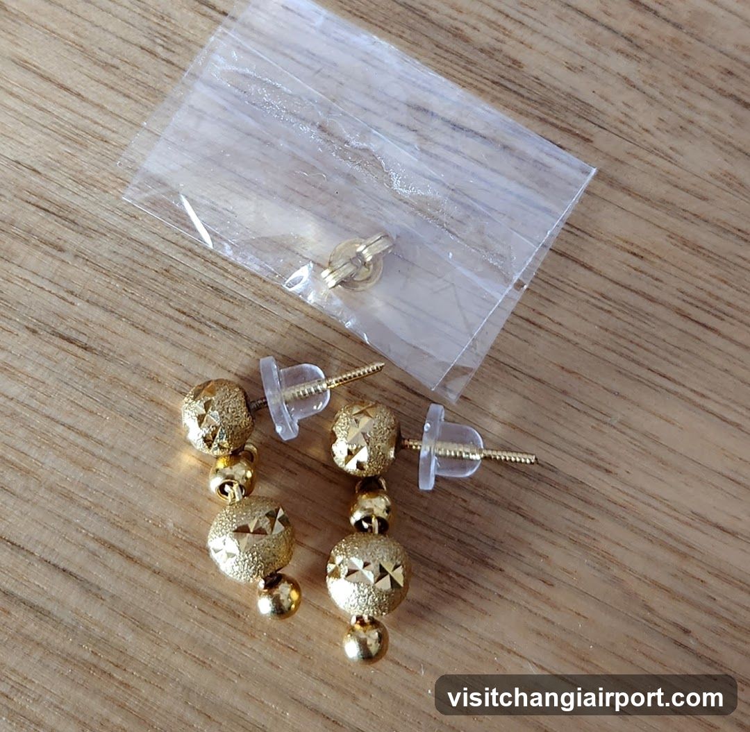 Gold Earrings with Clear Studs