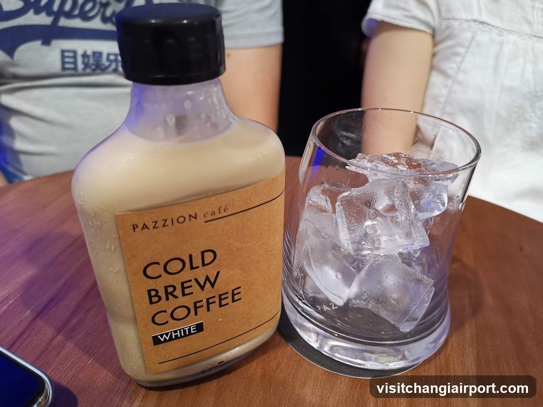 Cold Brew Coffee Bottle and Ice Glass