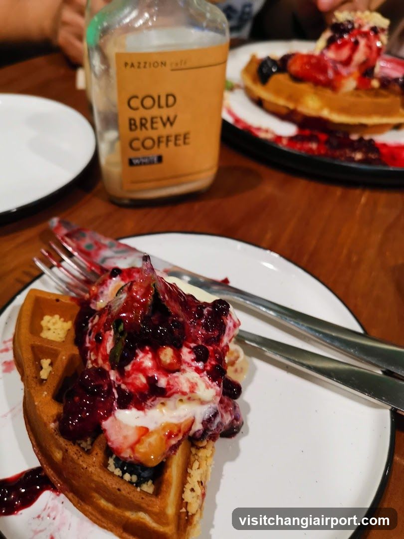 Waffles with berries and cold brew coffee