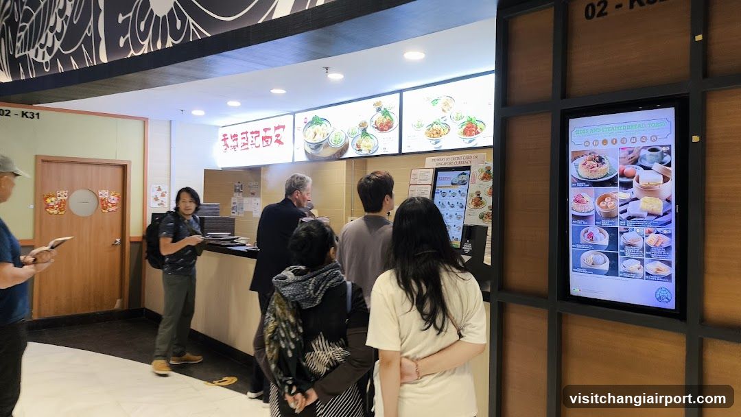 Dining Area with Menu Display and Staff