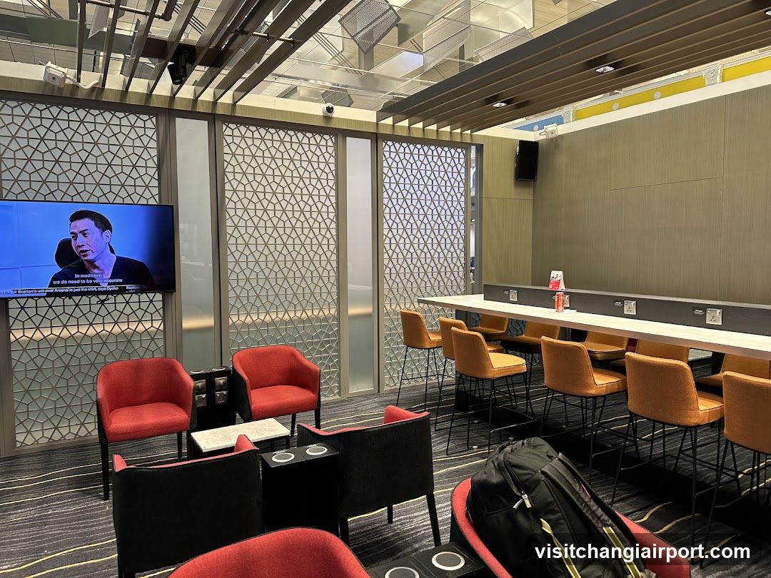 Lounge Interior with TV and Seating Area