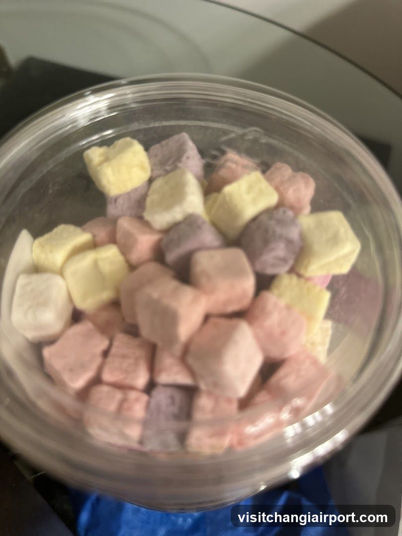 Colorful Marshmallow Cubes in Clear Container
