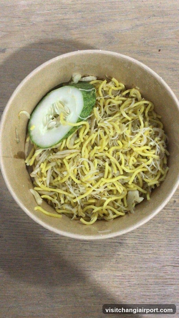 Bowl of noodles with cucumber