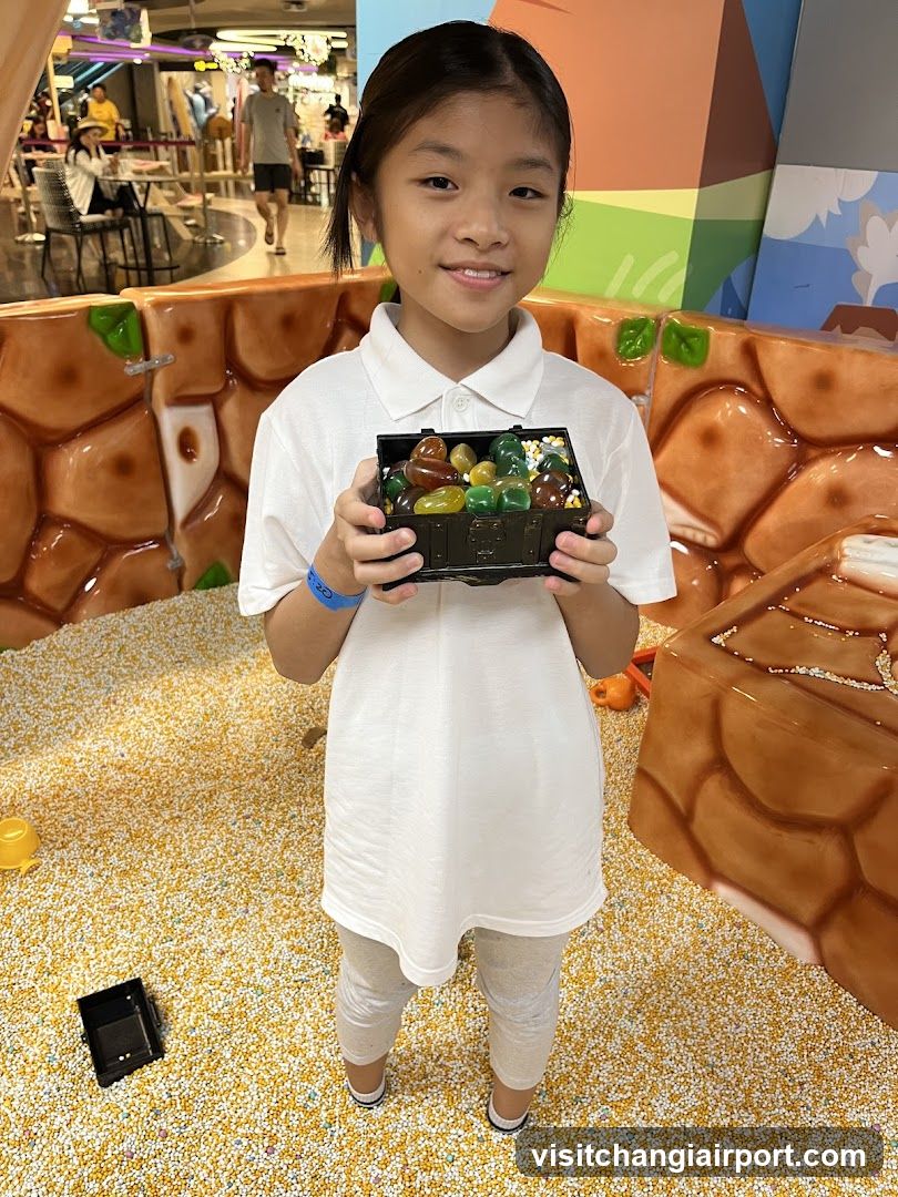 Child Holding Treasure Chest Toy