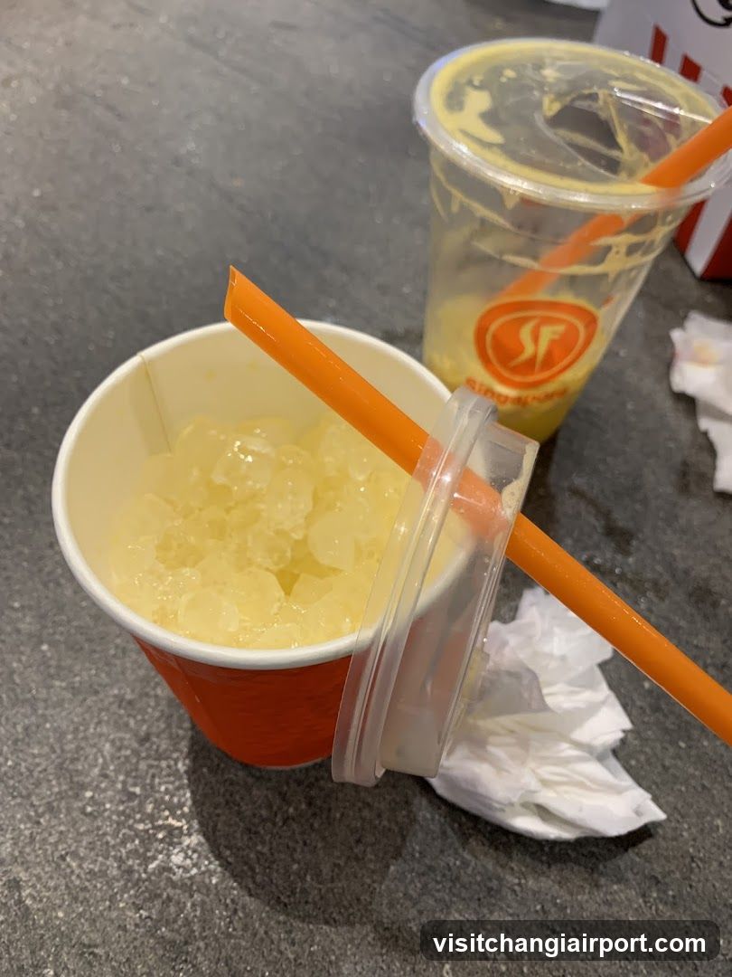 Orange and Yellow Drinks with Straws