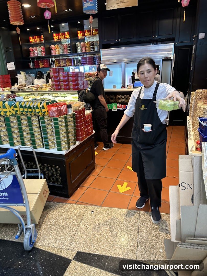Staff in a store holding food container