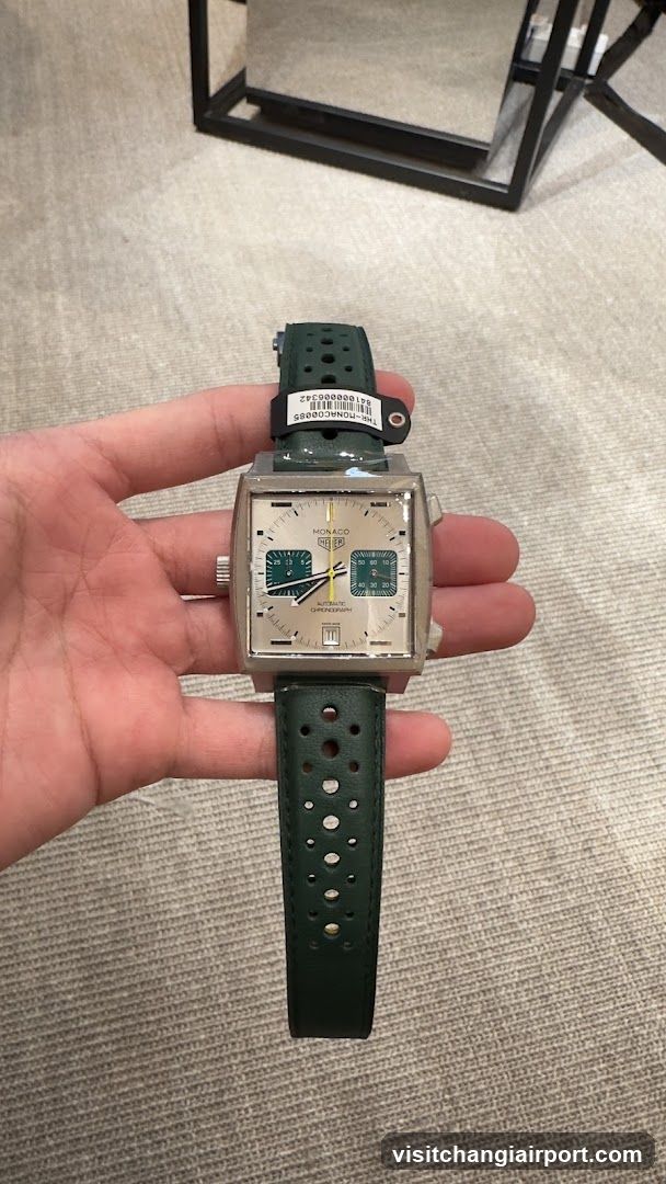 Watch held in hand