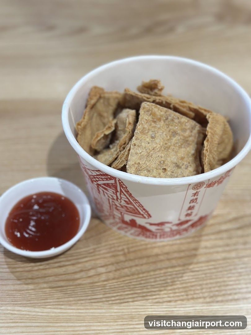 Food Cup with Crispy Snacks and Sauce