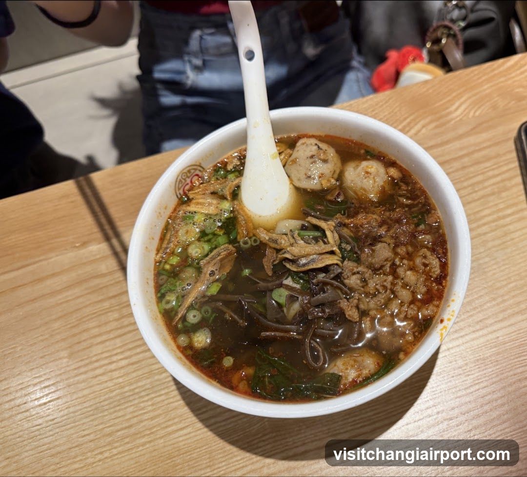 Bowl of Noodle Soup with Meatballs and Tofu Skin