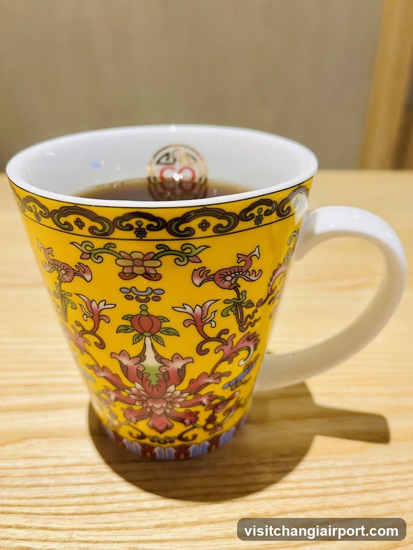 Decorated Mug with Tea