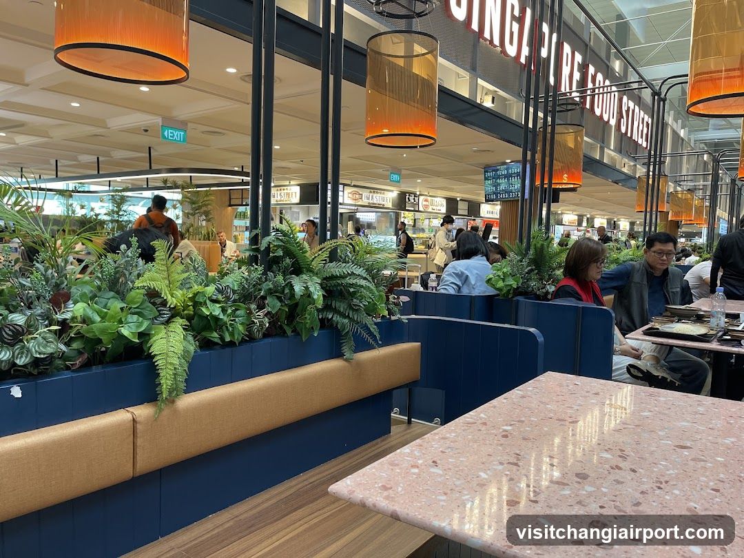 Food Court Interior with Plants and Dining Area