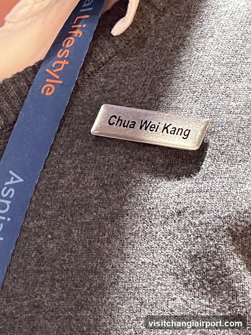 Name Badge on Grey Fabric