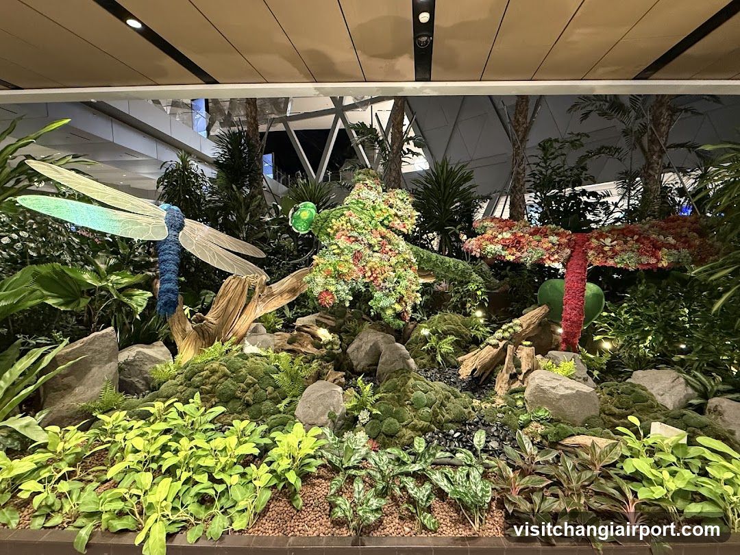 Floral Garden Display with Dragonfly Sculpture