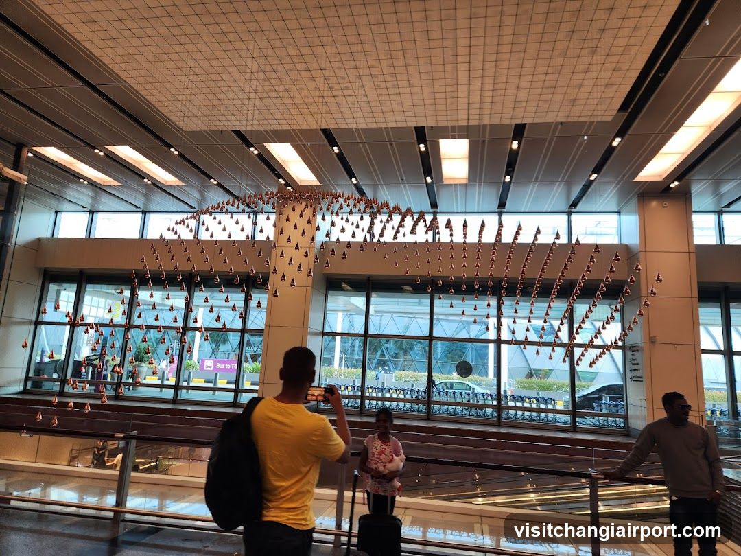 Airport Terminal Interior with Hanging Art Installation
