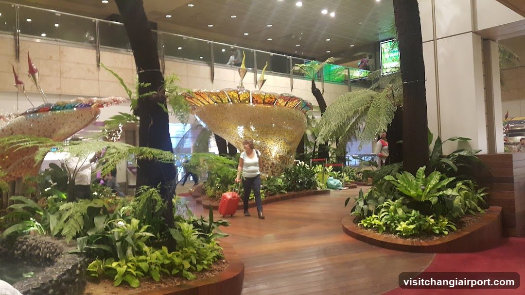 Indoor Garden Scene with Lush Plants and Decorative Structures