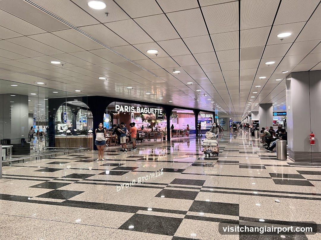 Airport Terminal Interior with Paris Baguette Storefront