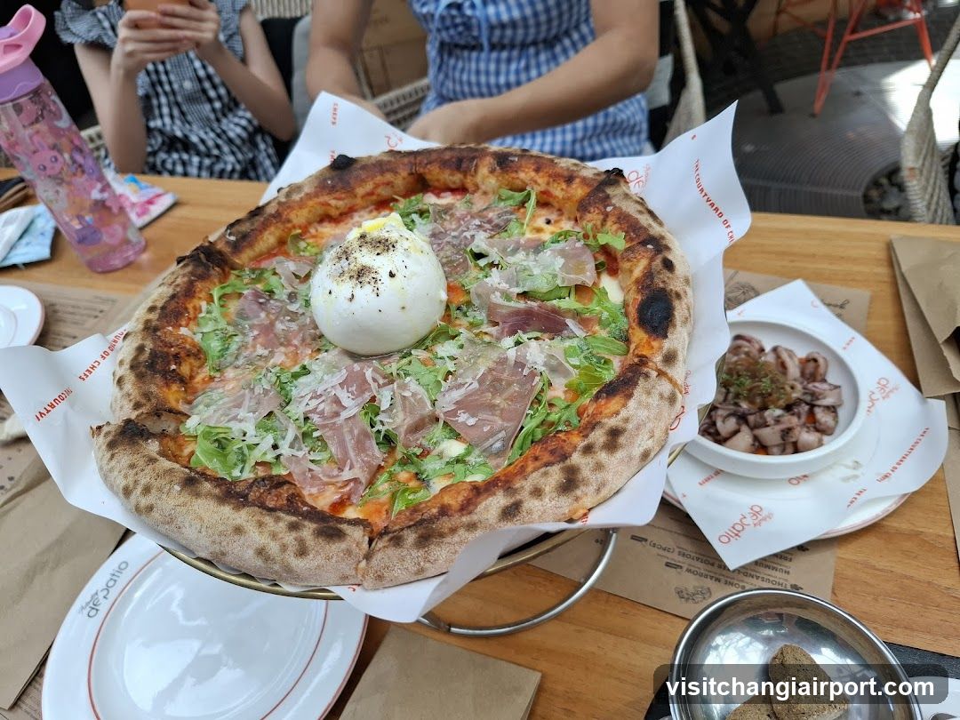 Pizza with Egg and Prosciutto
