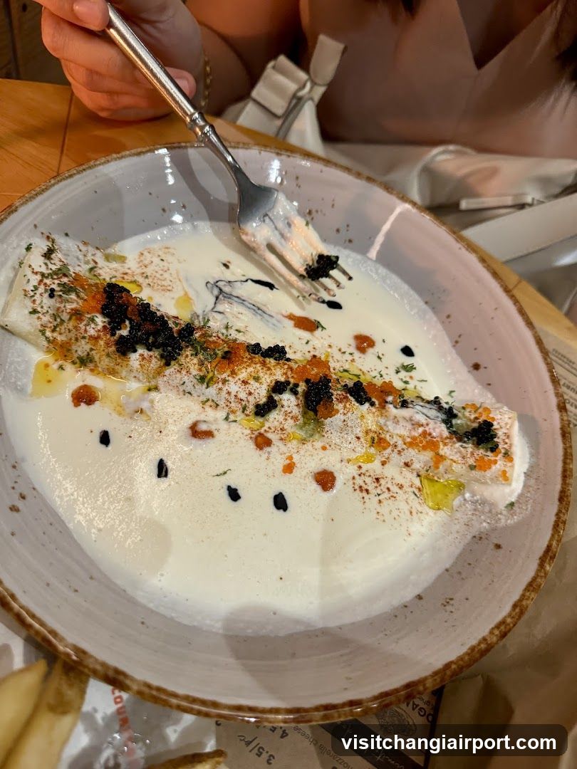 Fish dish with sauce and garnish
