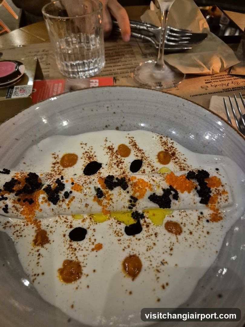 Plated Dish with Caviar and Sauce