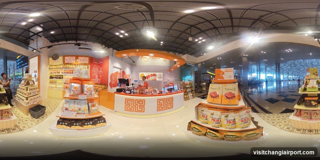 Interior of a food shop with product displays and counter