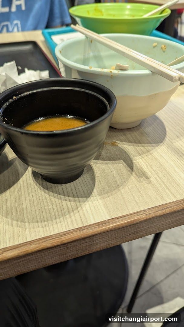 Table with bowls and chopsticks