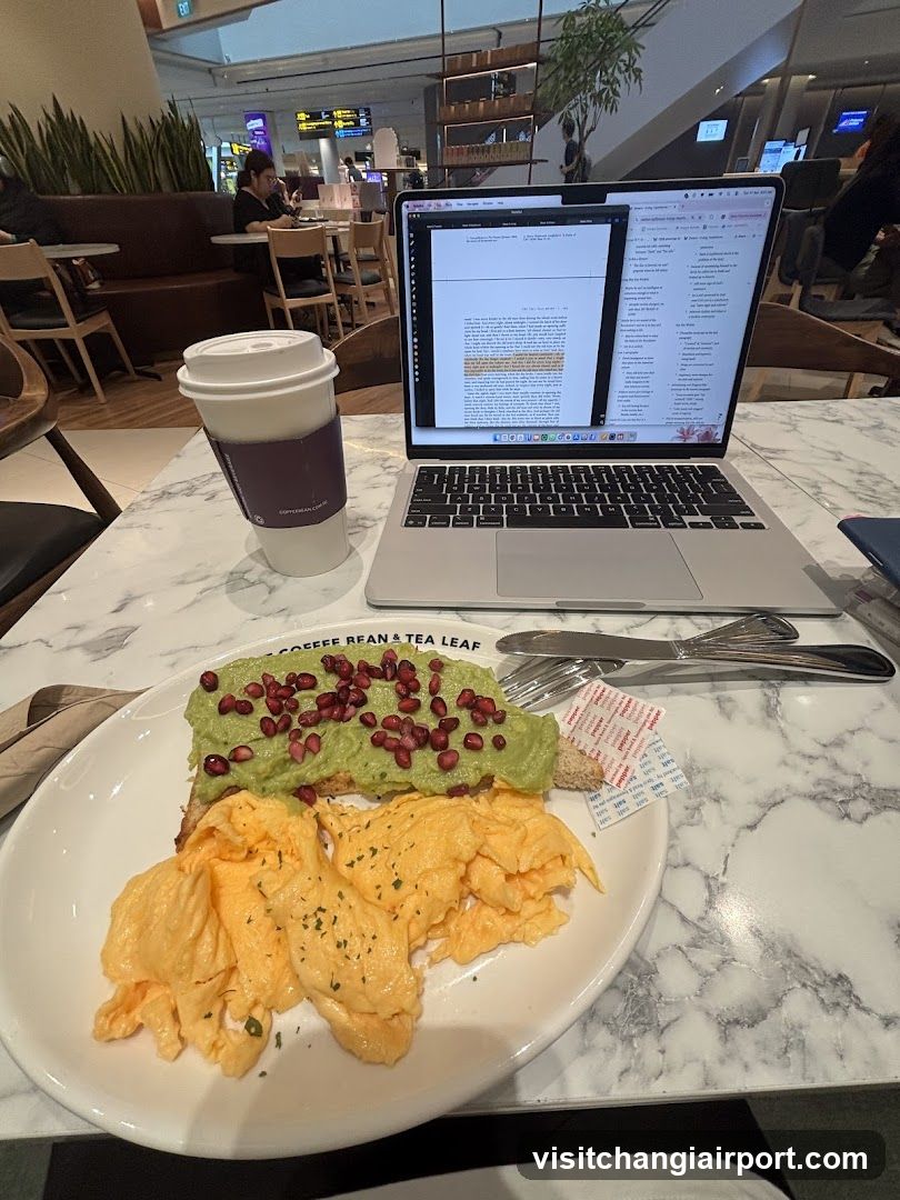 Breakfast with laptop at coffee shop