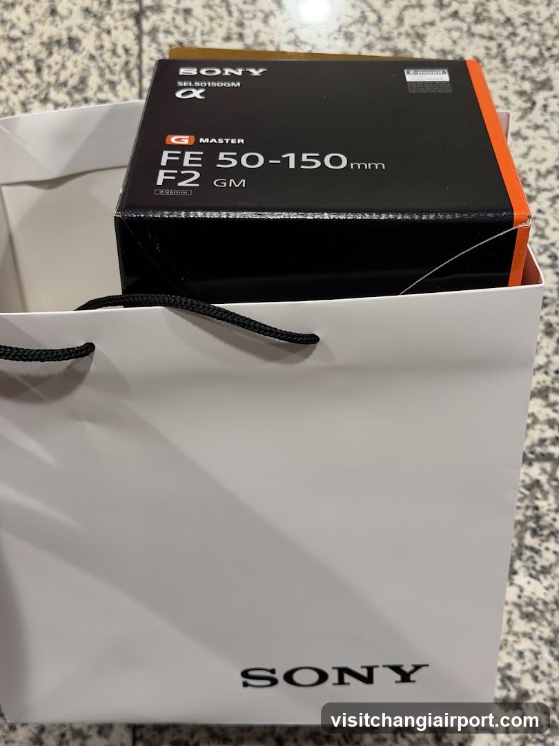 Sony Camera Lens Box in Shopping Bag