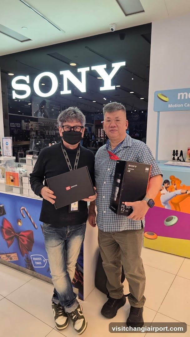 Sony Store Interior with Two Men Holding Products