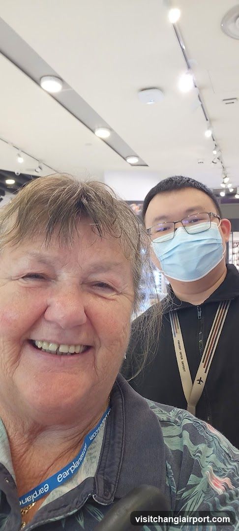 Selfie with two people indoors