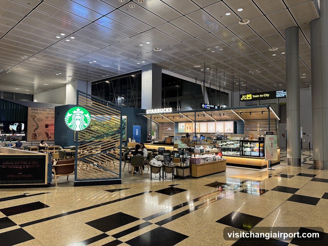 Starbucks and Train to City in Airport Terminal